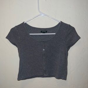 A grey crop top with great texture